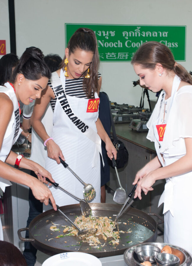 Mayra Dias, Miss Brazil 2018; Rahima Dirkse, Miss Netherlands 2018; and Filipa Barroso, Miss Portugal 2018; learn to make Pad Thai during an excursion to Nongnooch Botanical Garden in Pattaya, Thailand on December 7th. The Miss Universe contestants are touring, filming, rehearsing and preparing to compete for the Miss Universe crown in Bangkok, Thailand. Tune in to the FOX telecast at 7:00 PM ET live/PT tape-delayed on Sunday, December 16, 2018 from the IMPACT Arena in Bangkok, Thailand to see who will become the next Miss Universe. HO/The Miss Universe Organization